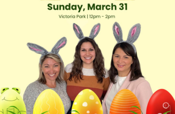 Three women with Easter bunny ear headbands on.